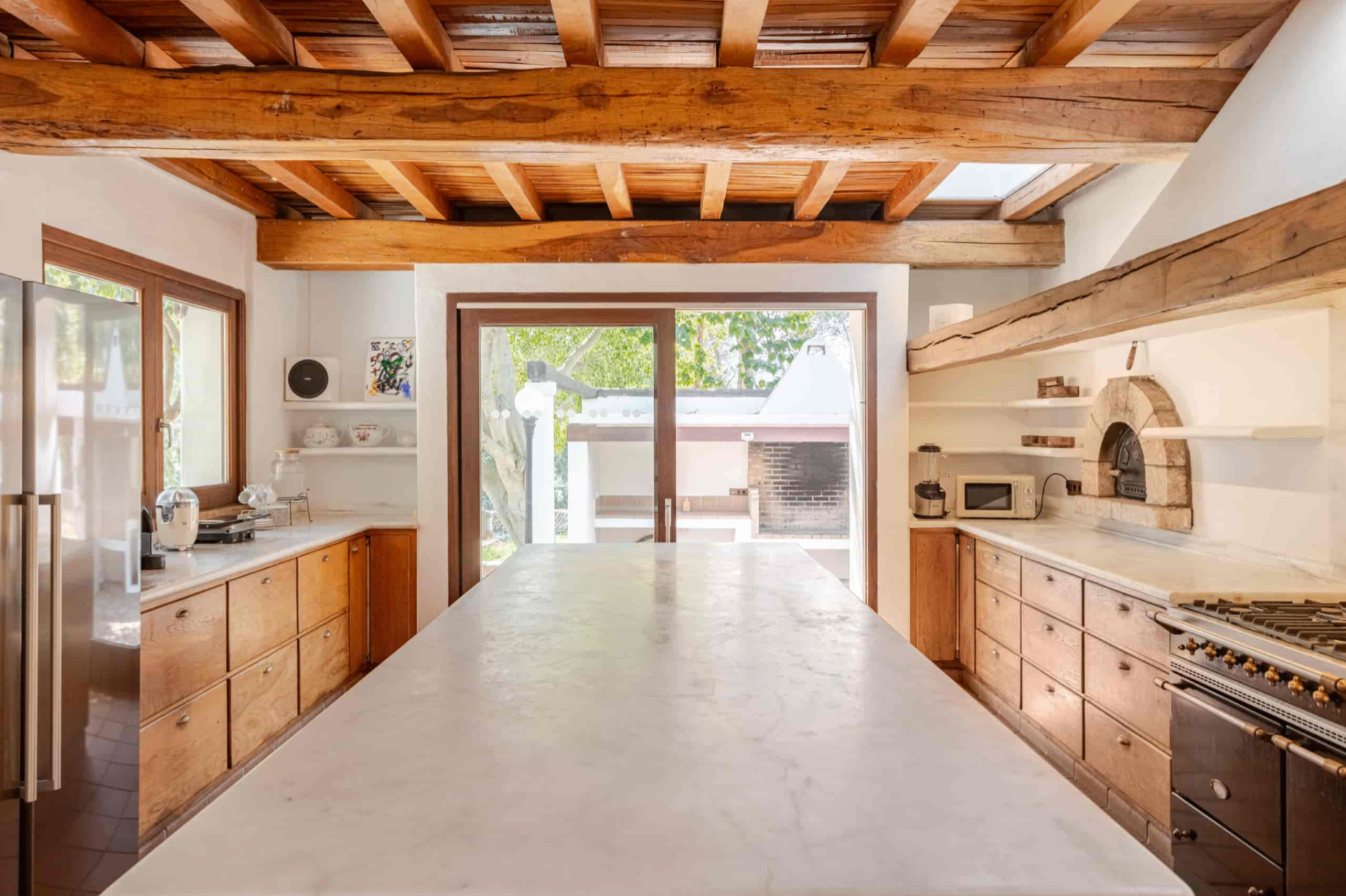 Spacious kitchen with marble island