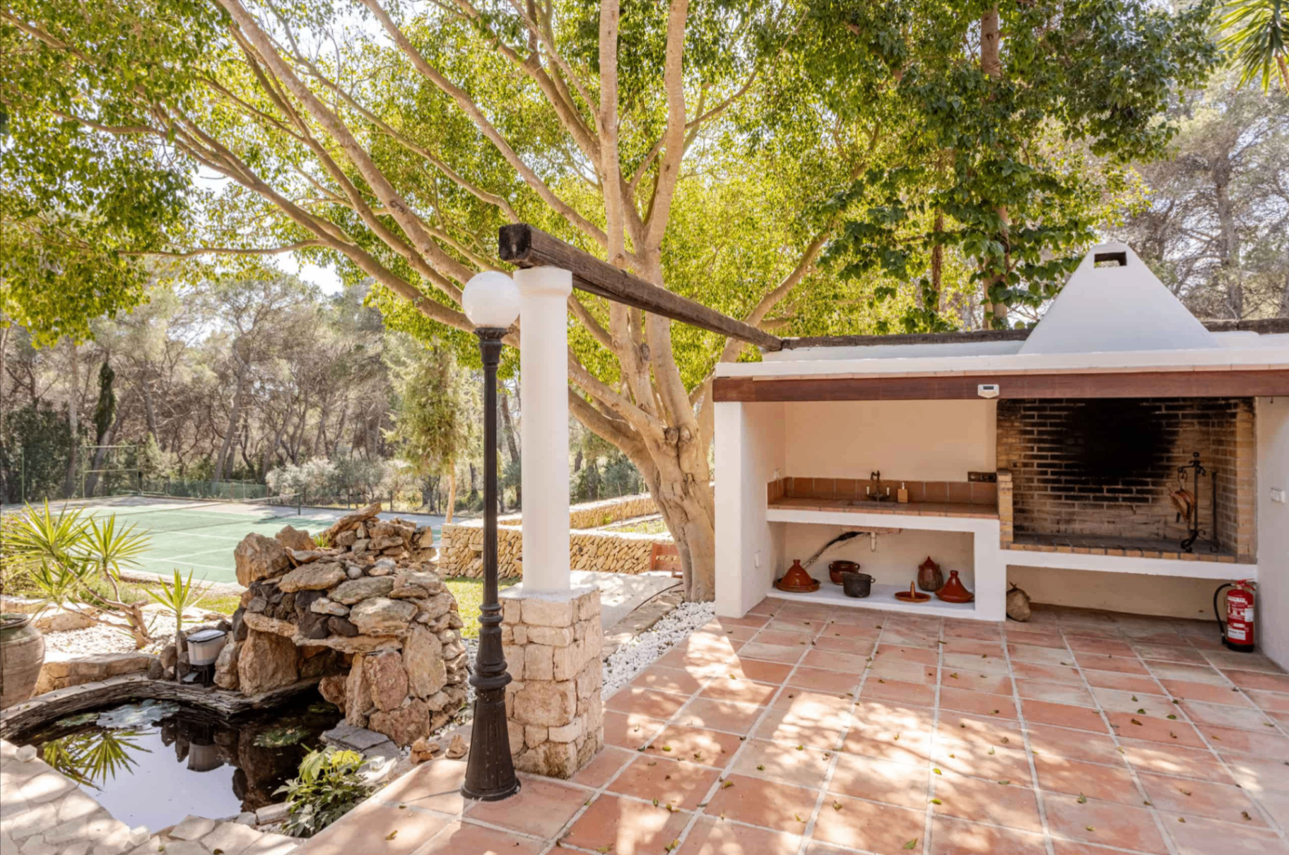Barbecue terrace with pond