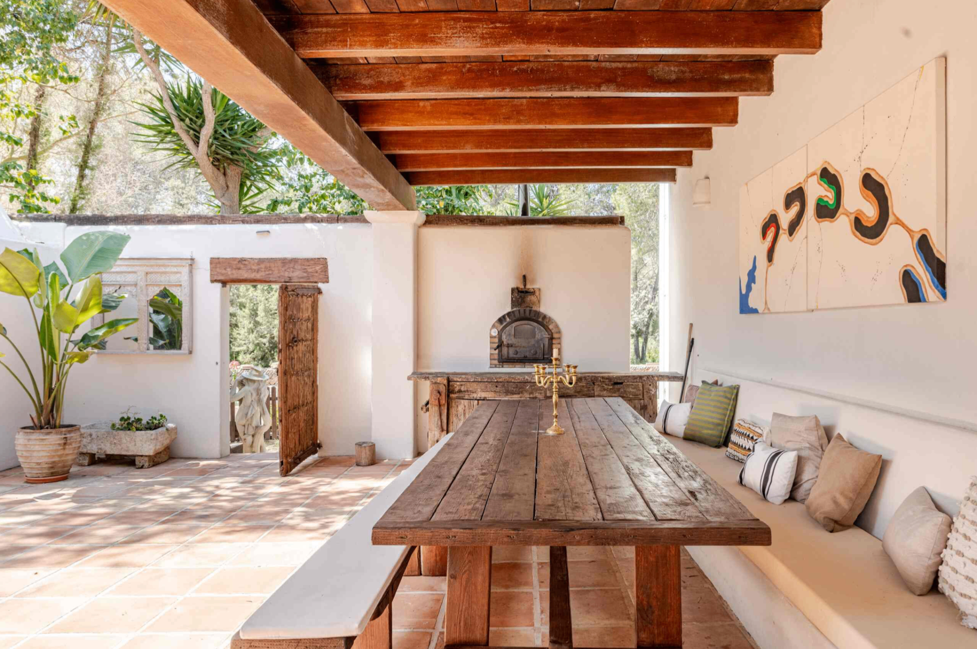 Covered outdoor dining table