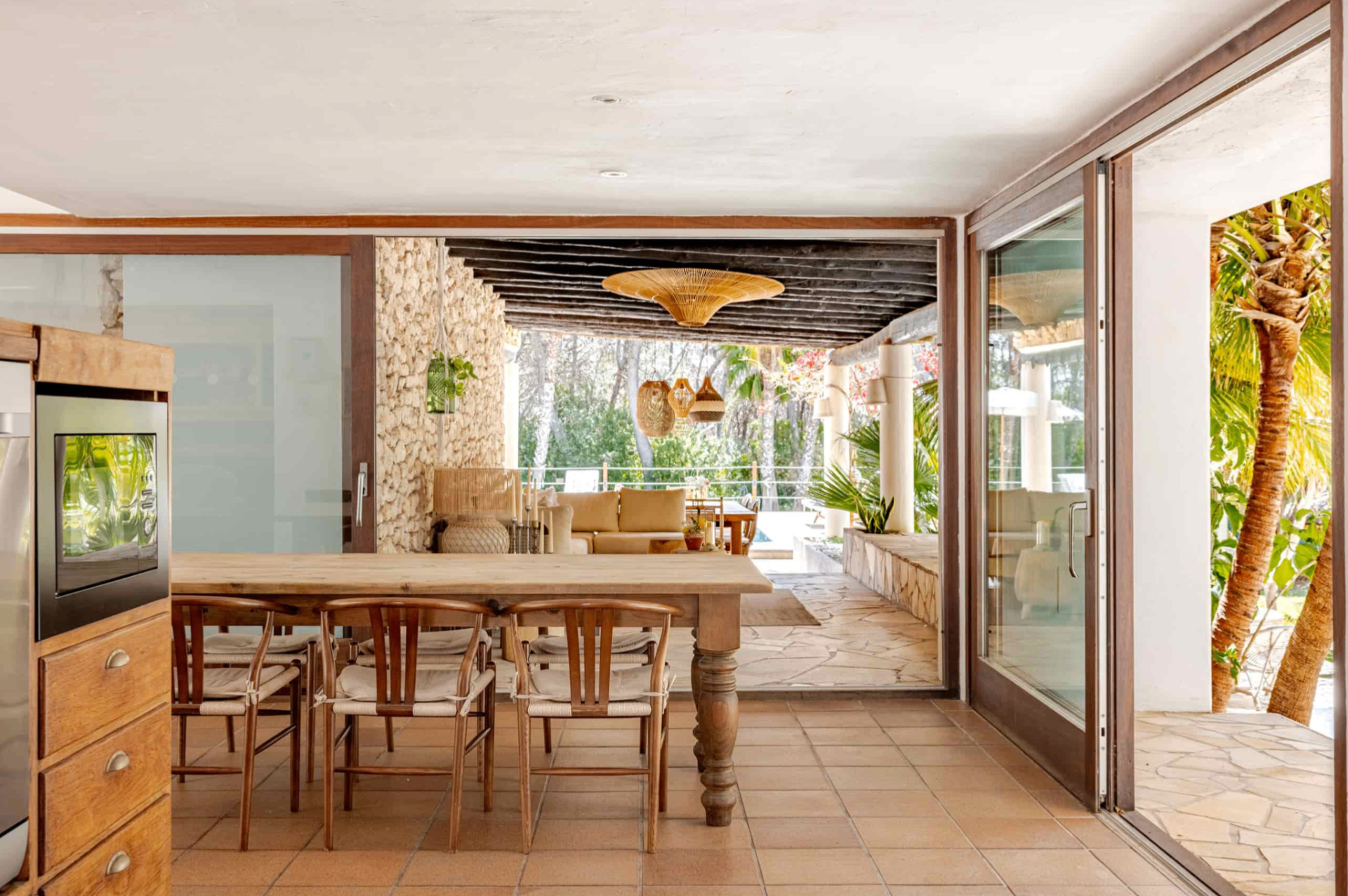 Indoor dining room opening to the terrace