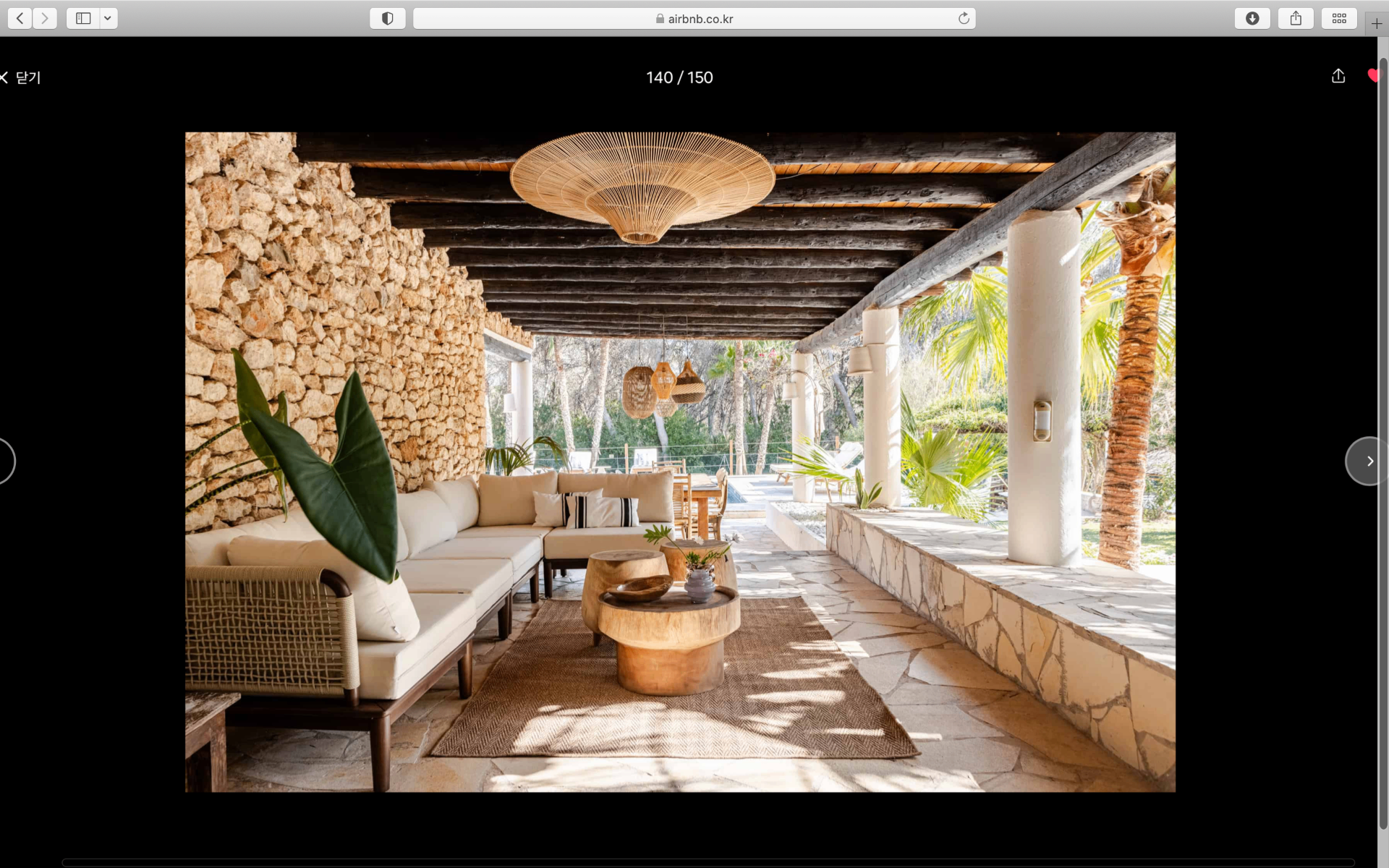 Covered stone terrace lounge
