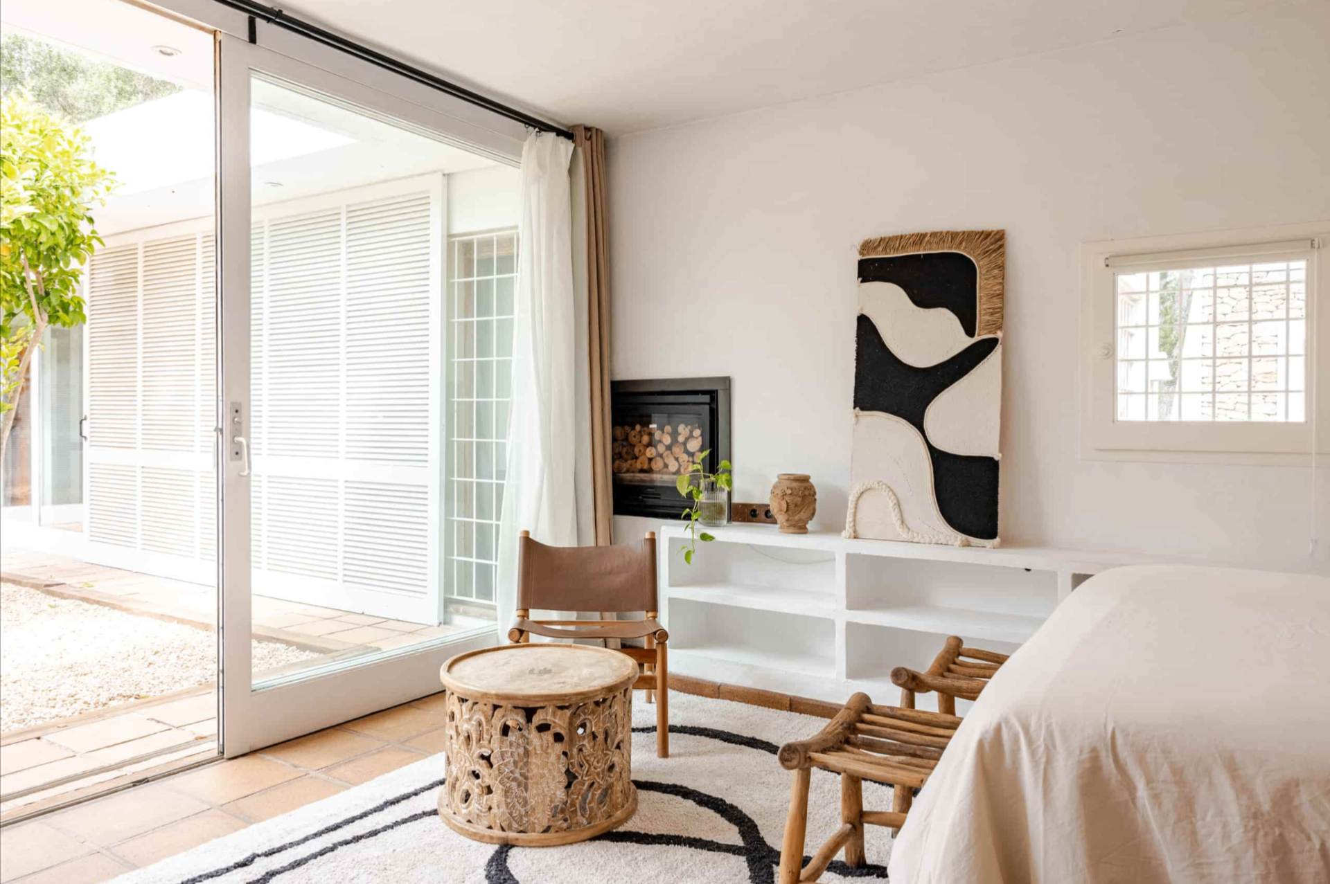 Bedroom seating area with garden view