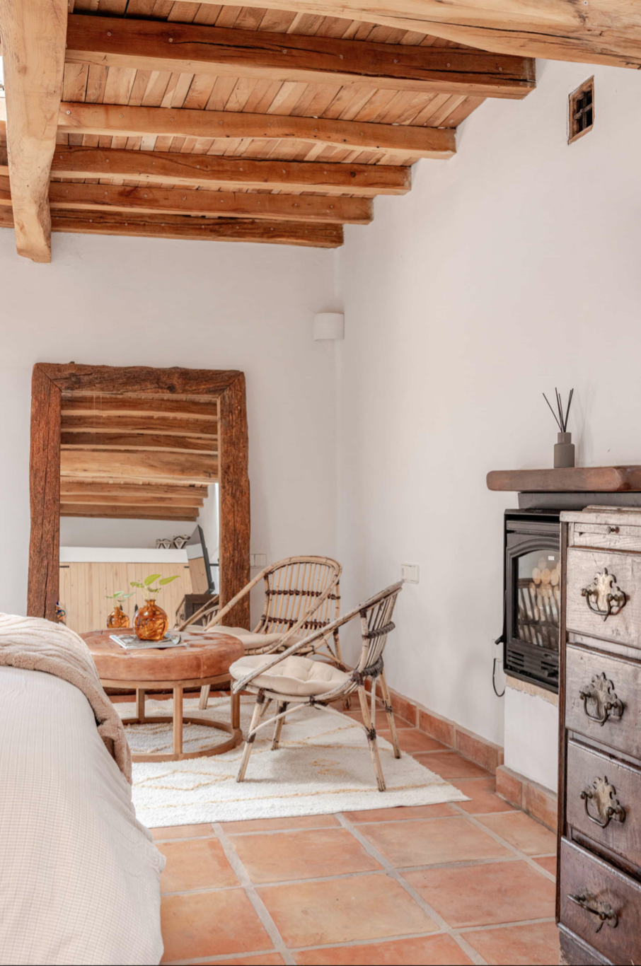 Bedroom sitting corner with rattan chairs
