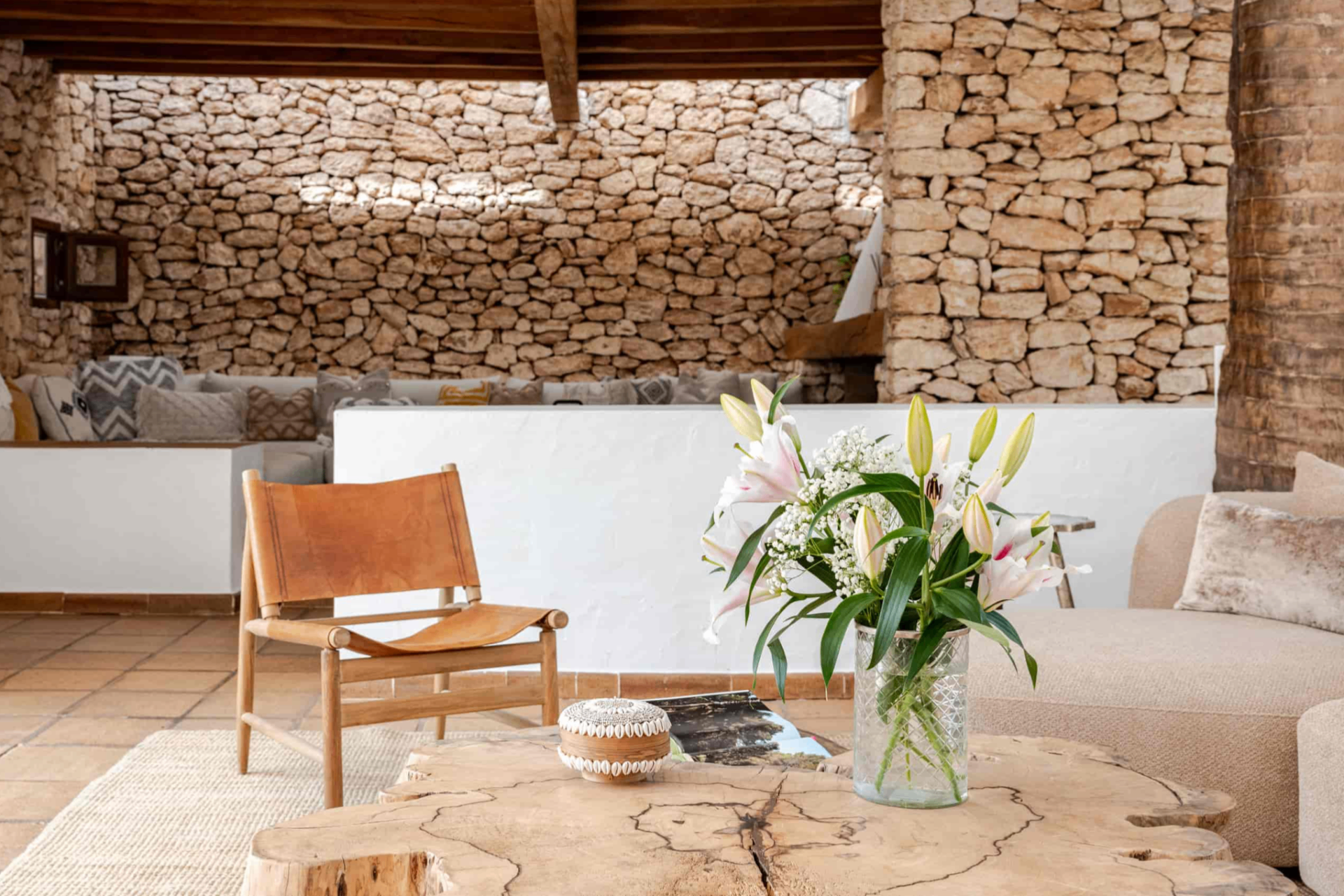 Living room detail with stone wall